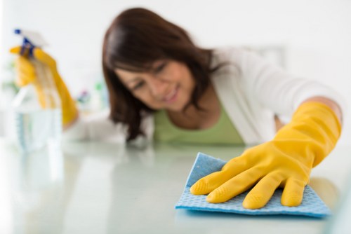 Local cleaner preparing a short-let property in NW1