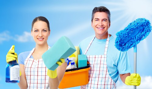 Technician performing oven cleaning in NW1